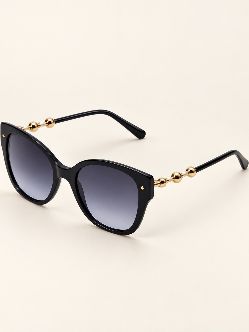 Carolina Herrera Black Cateye Sunglasses with Purple Gradient Lenses